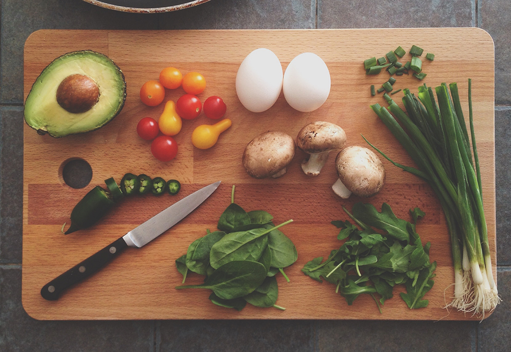 photo of assorted vegetables on a wooden cutting board